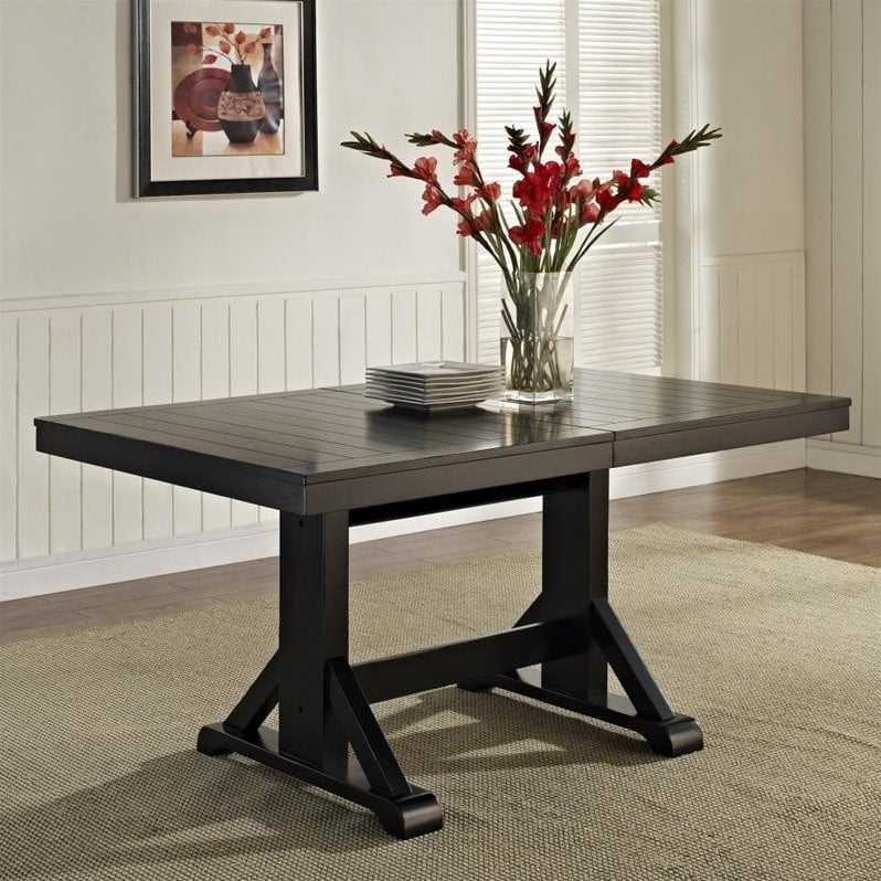 Pemberly Row Extendable Trestle Wood Dining Table in Antique Black