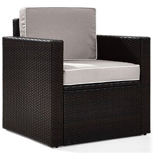 pemberly row wicker patio arm chair with gray cushions