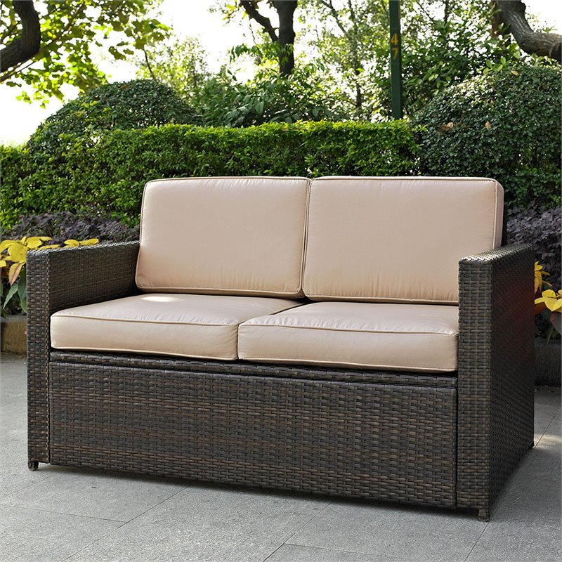 Pemberly Row Wicker Patio Loveseat In Brown with Sand Cushions