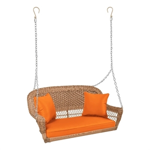 Pemberly Row Honey Wicker Porch Swing with Orange Cushion