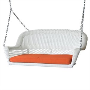 pemberly row wicker porch swing in white with orange cushion