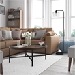 Pemberly Row Round Metal Base Coffee Table in Black and Bronze