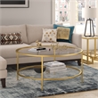 Pemberly Row Round Metal Base Coffee Table in Brass with Glass Top