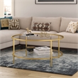 Pemberly Row Round Metal Base Coffee Table in Brass with Glass Top
