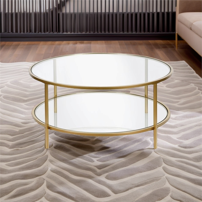 Pemberly Row Round Metal Base Coffee Table in Brass with Glass Top