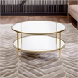 Pemberly Row Round Metal Base Coffee Table in Brass with Glass Top