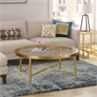 Pemberly Row Round Metal Base Coffee Table in Brass and Gold