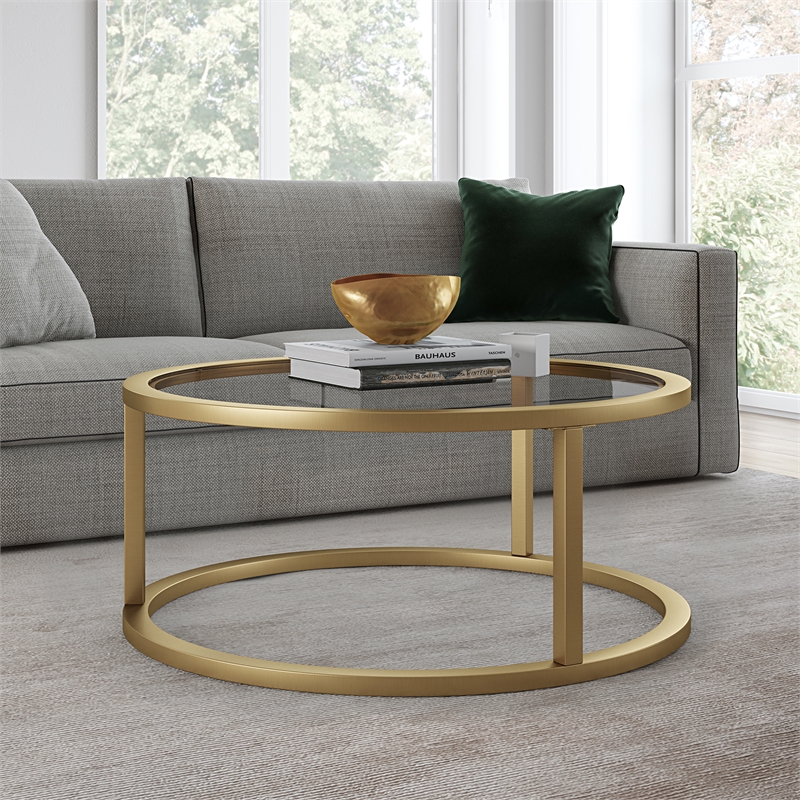 Pemberly Row Metal Round Pedastal Base Coffee Table in Gold and Brass Finish