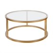Pemberly Row Metal Round Pedastal Base Coffee Table in Gold and Brass Finish