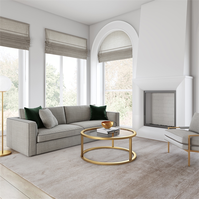 Pemberly Row Metal Round Pedastal Base Coffee Table in Gold and Brass Finish