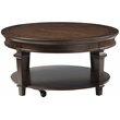 Pemberley Row Wood Espresso Coffee Table Round Casters 40