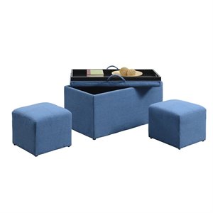 pemberly row storage bench with two side ottomans in blue fabric