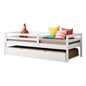 pemberly row solid wood daybed for kids with trundle and guard rails in white