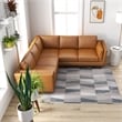 Pemberly Row Mid-Century Symmetrical Genuine Leather Corner Sofa in Tan