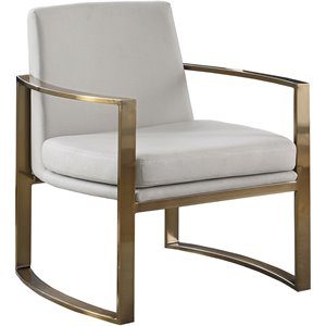 pemberly row modern concave metal arm accent chair in cream and bronze