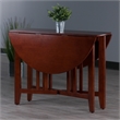 Pemberly Row Round Double Drop Leaf Solid Wood Dining Table in Antique Walnut