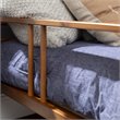 Pemberly Row Spindle Tapered Front Legs Solid Wood Daybed in Brown/Caramel
