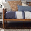 Pemberly Row Spindle Tapered Front Legs Solid Wood Daybed in Brown/Caramel