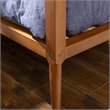 Pemberly Row Spindle Tapered Front Legs Solid Wood Daybed in Brown/Caramel