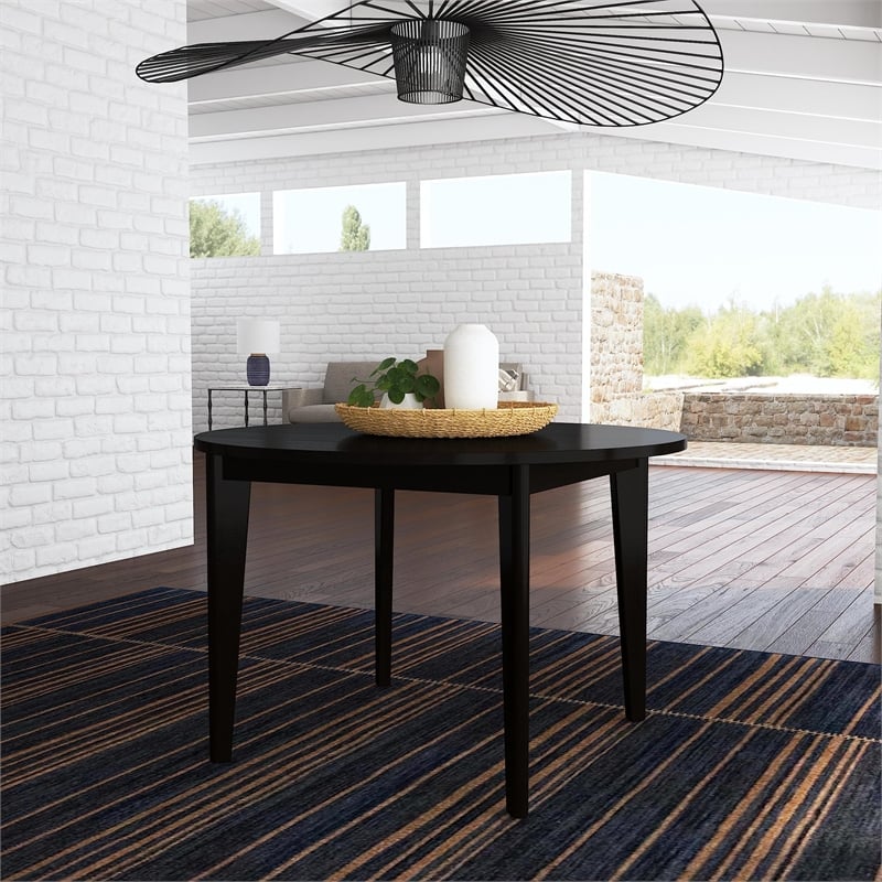 Pemberly Row Round Mid-Century Wood Dining Table in Black Finish