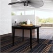 Pemberly Row Round Mid-Century Wood Dining Table in Black Finish