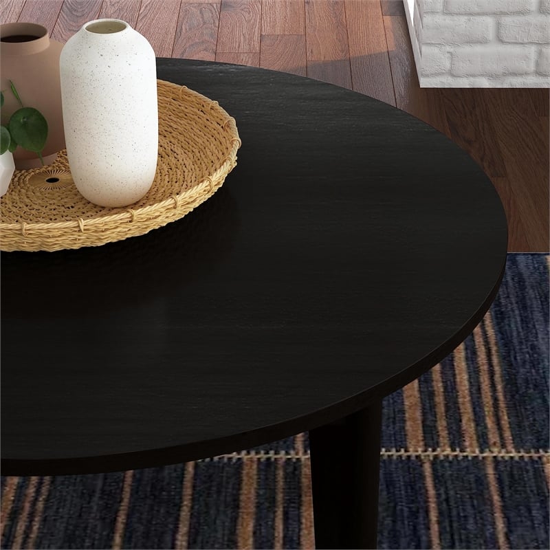 Pemberly Row Round Mid-Century Wood Dining Table in Black Finish