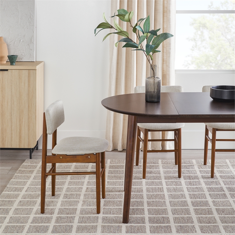 Pemberly Row Oval Solid Wood Dining Table with Removable Leaf in Walnut