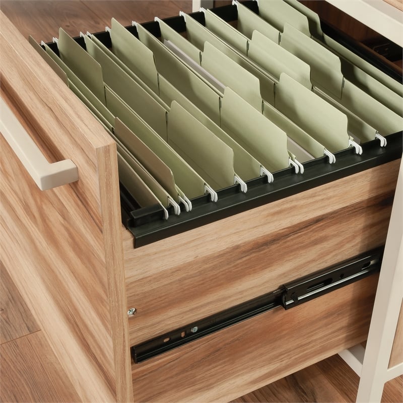 Pemberly Row Engineered Wood L-Desk in Kiln Acacia / Brown Finish