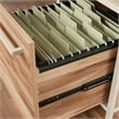Pemberly Row Engineered Wood L-Desk in Kiln Acacia / Brown Finish