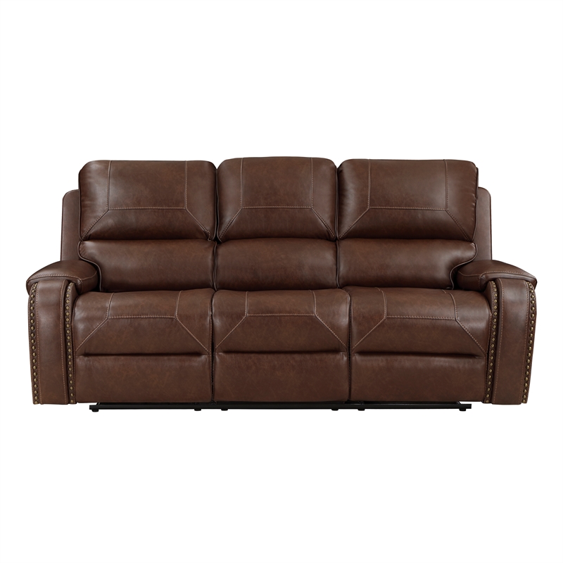 Pemberly Row Faux Leather Double Manual Reclining Sofa in Brown