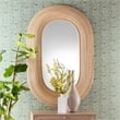 Pemberly Row Bohemian Natural Brown Rattan Oval Accent Wall Mirror