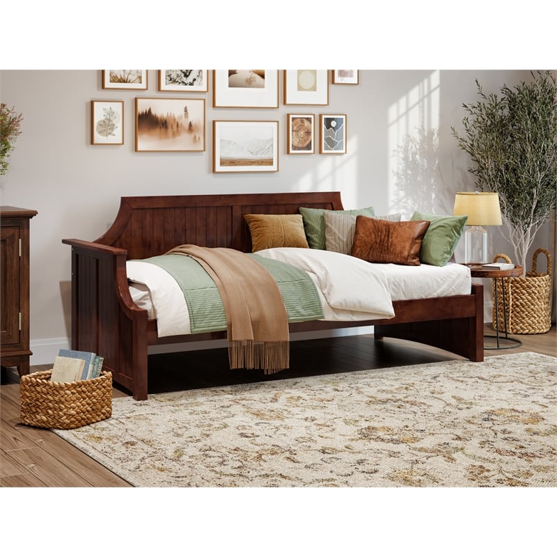 Pemberly Row Mid-Century Solid Wood Twin Daybed with Curved Backboard in Walnut