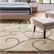 Pemberly Row 5' x 8' Scrolling Vine Shag Area Rug in Cream and Beige