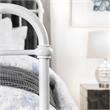 Pemberly Row Contemporary Metal King Spindle Bed in Vintage White