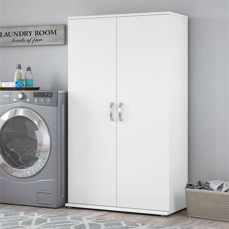 Pemberly Row Tall Linen Cabinet with Doors in White - Engineered Wood