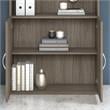Pemberly Row Tall 5 Shelf Bookcase with Doors in Hickory - Engineered Wood