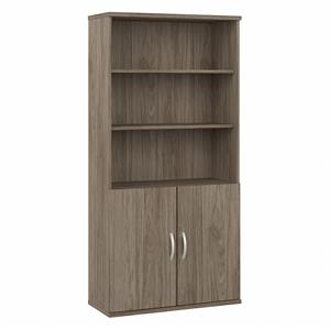 Pemberly Row Tall 5 Shelf Bookcase with Doors in Hickory - Engineered Wood