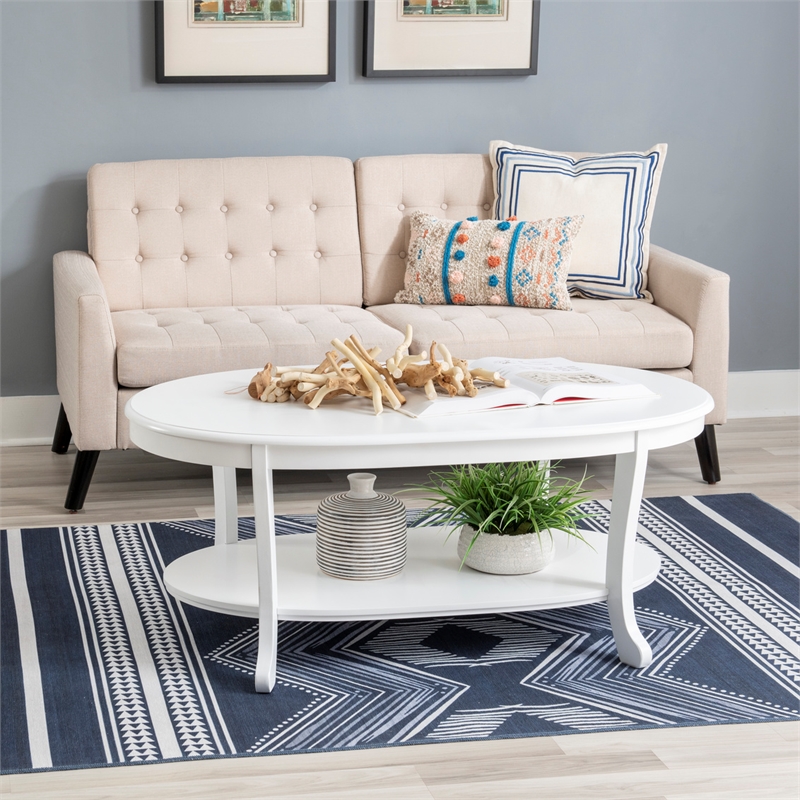 Pemberly Row Wood Oval Coffee Table with Shelf in White Painted Finish
