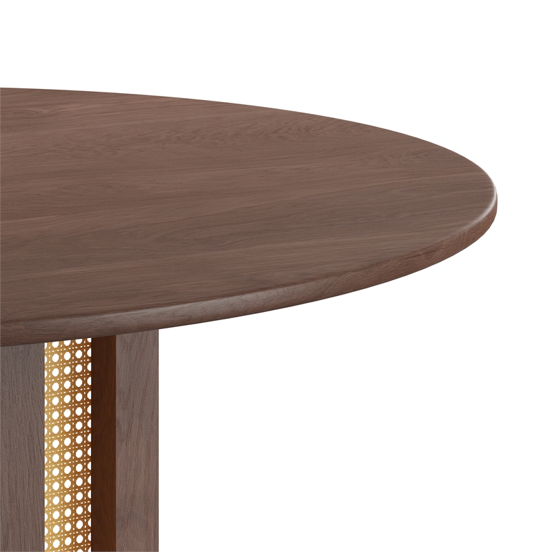 Pemberly Row Modern Round Dining Table with Cane Base in Walnut