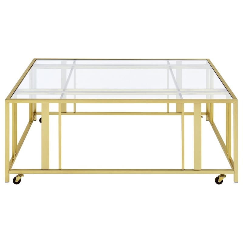 Pemberly Row Square Glass Top Coffee Table with Casters in Gold
