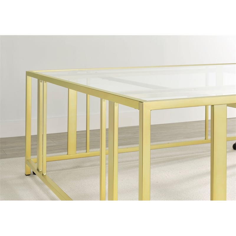 Pemberly Row Square Glass Top Coffee Table with Casters in Gold