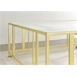 Pemberly Row Square Glass Top Coffee Table with Casters in Gold