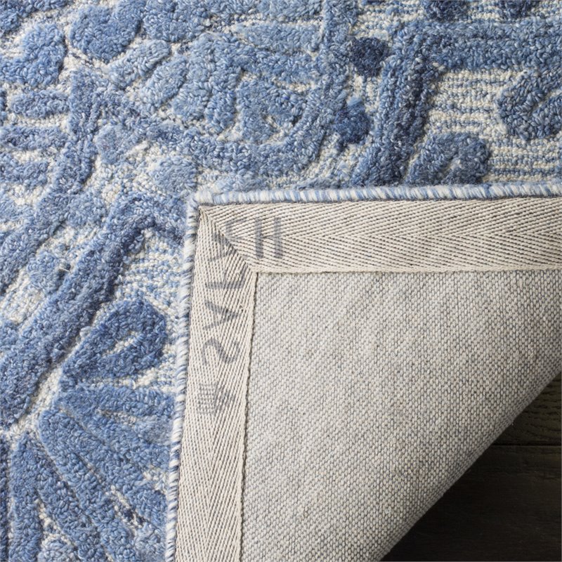 Pemberly Row Modern 5' x 8' Hand Tufted Wool Rug in Blue and Ivory
