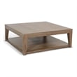 Pemberly Row Mahogany Wood Coffee Table with Casters in Light Brown