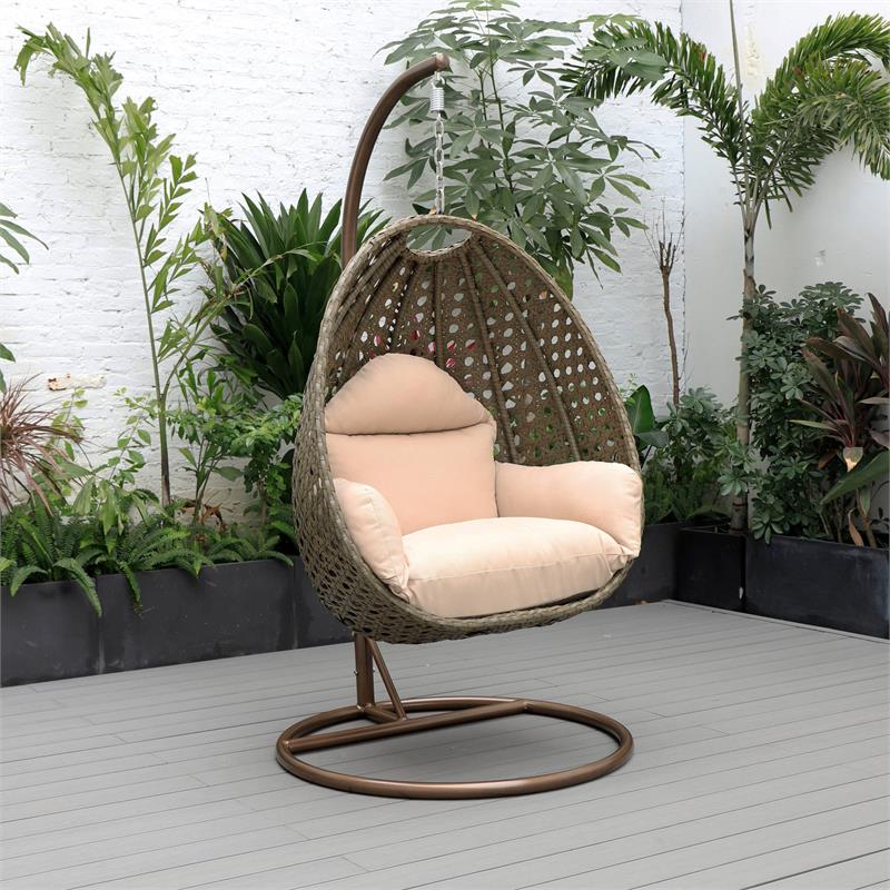 Pemberly Row Beige Wicker Patio Egg Swing Chair with Stand in Beige