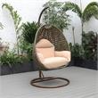 Pemberly Row Beige Wicker Patio Egg Swing Chair with Stand in Beige