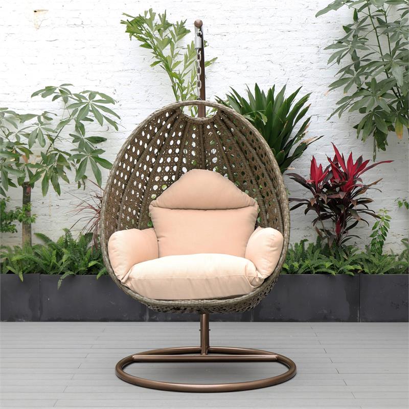Pemberly Row Beige Wicker Patio Egg Swing Chair with Stand in Beige