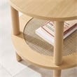 Pemberly Row Round Wood Side Table with Lower Rattan Shelf in Oak