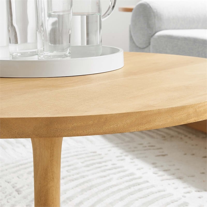 Pemberly Row Round Wood Coffee Table with Tapered Pedestal Base in Oak