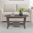 Pemberly Row Oval Coffee Table with Shelf in Gray Wood Finish